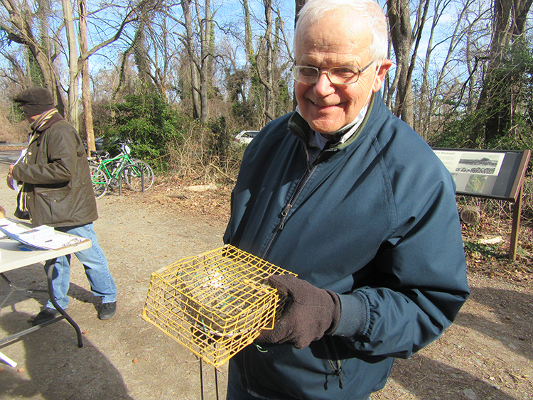 FODM Board member David Barbour showed volunteers the bait trap for FODMs wildlife project